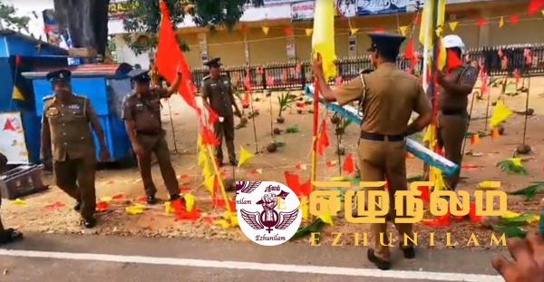 அளம்பில் மாவீரர் துயிலும் இல்லத்தில் கொடிகளை அகற்றியெறிந்த பொலிஸார் – ஒருவர் கைது